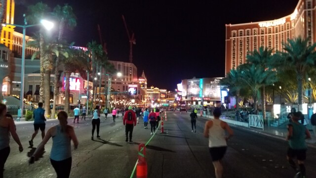 There's Treasure Island on the left. The pirate ship show was going on as I passed, with lots of flame and music and stuff. Notice the tape separating the full marathoners from the half marathoners. Las Vegas Rock 'n' Roll Marathon 20