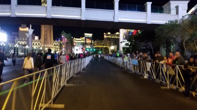 The final stretch. The crowd got more and more rowdy, the closer to the finish line we got. Since our names were printed on our bibs, lots of them cheered us on by name. Las Vegas Rock 'n' Roll Marathon 22